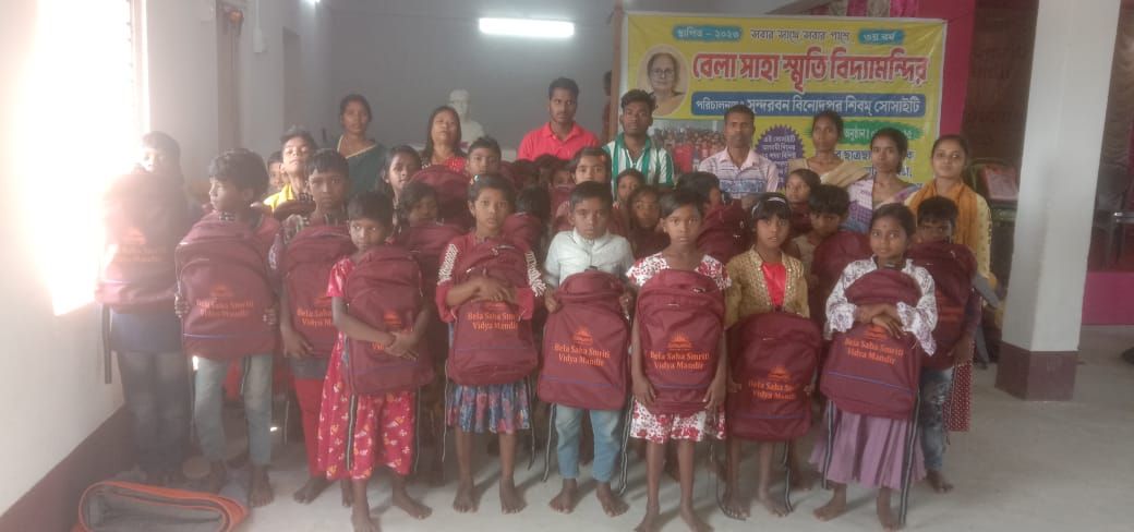 A group of children wearing their new school bags